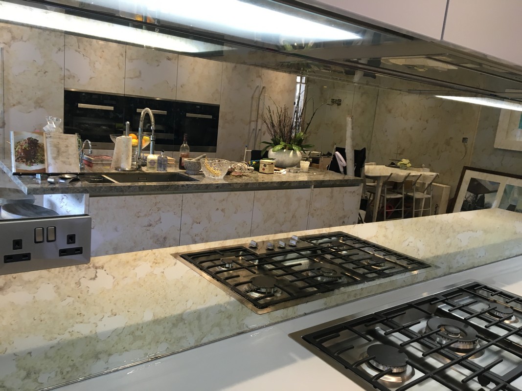 Mirror glass splashback in Catford luxury kitchen